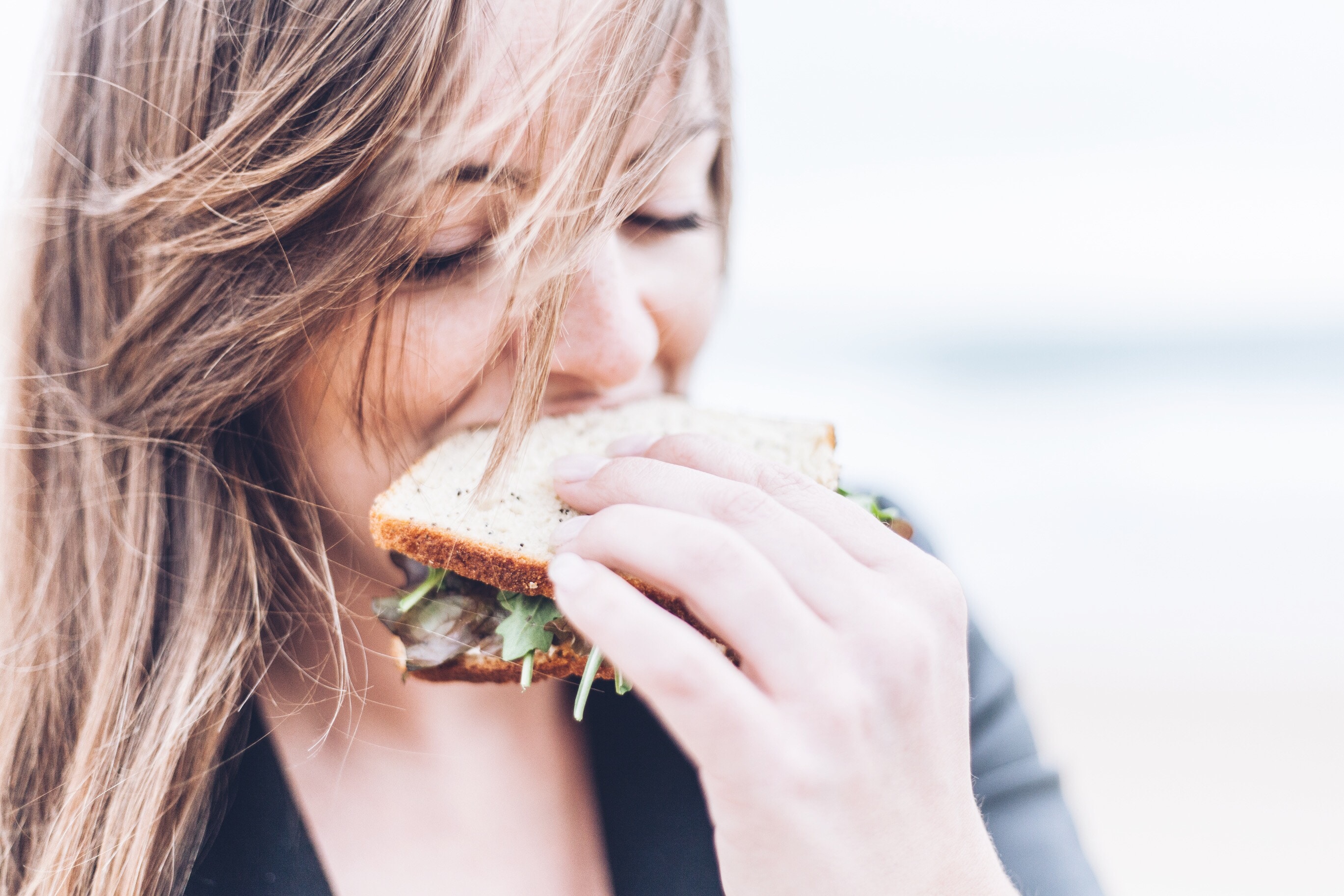Woman eating sandwich (1)